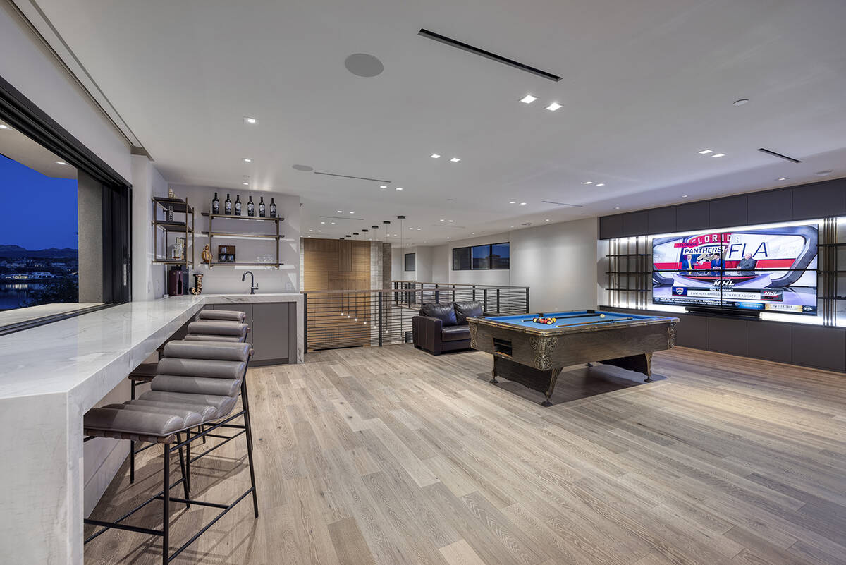 The home features a private upper-level game room. (JPM Photography by John Martarano)