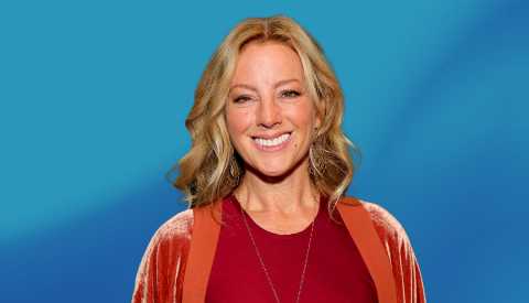 Sarah McLachlan against blue ombre background
