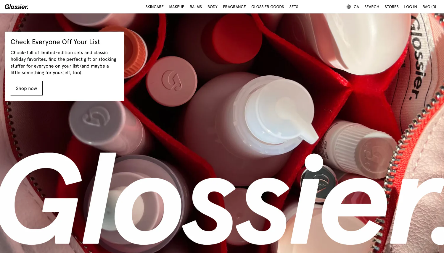 Glossier website homepage with limited-edition holiday gift sets.
