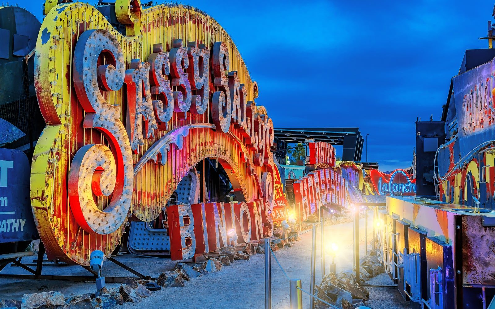 An image of the Neon Boneyard during the evening with Sassy Sally's