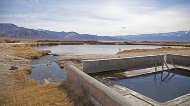 Discover Fish Lake Valley Hot Springs, a soaking spot with mountain views and dark skies, perfect for stargazing. Explore the nearby Gold Point Ghost Town for a touch of history.