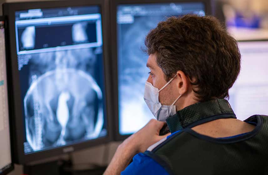 Healthcare provider reviewing a scan.