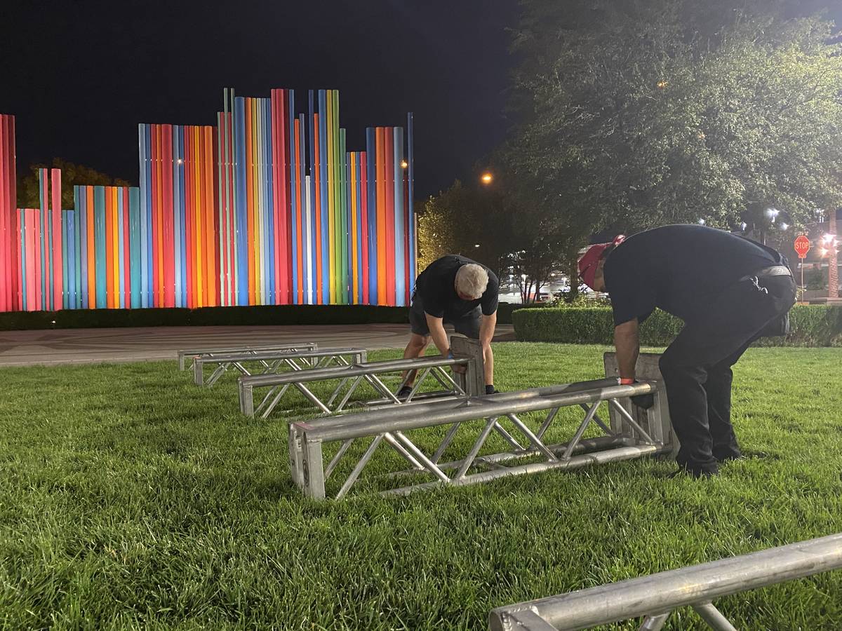 Thomas "Toe" Morris and Perry Harris are shown breaking down the "truss garden" after the "Red ...