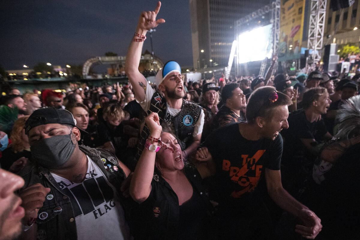 People mosh during a performance by Leftover Crack at the Punk Rock Bowling Music Festival at t ...
