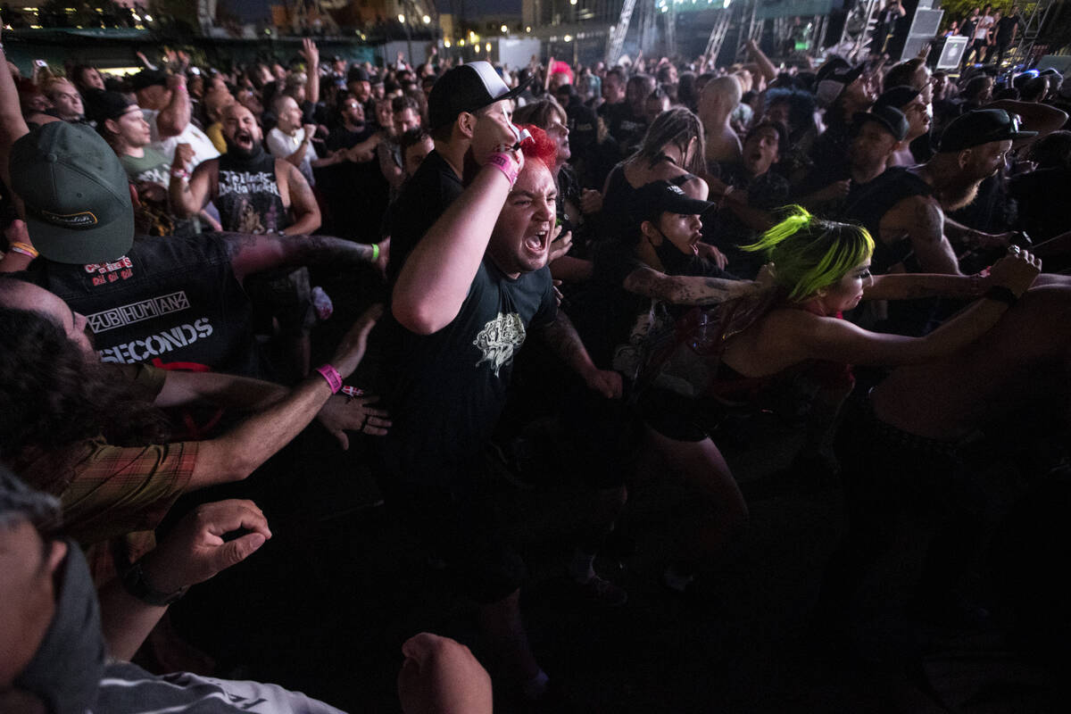People mosh during a performance by Leftover Crack at the Punk Rock Bowling Music Festival at t ...