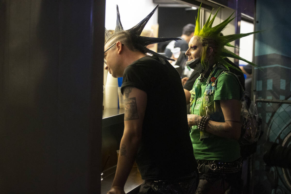 People attend the Punk Rock Bowling Music Festival at the Downtown Las Vegas Events Center in L ...