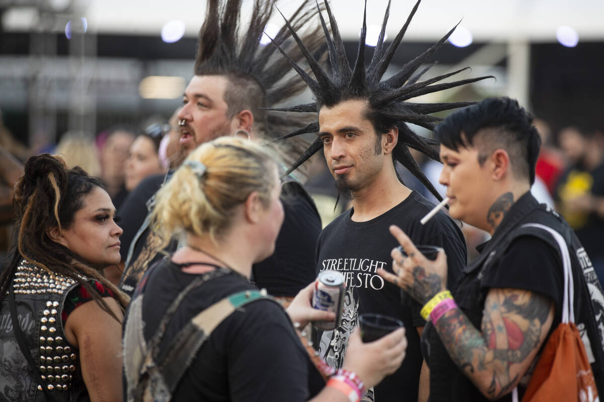 People attend the Punk Rock Bowling Music Festival at the Downtown Las Vegas Events Center in L ...