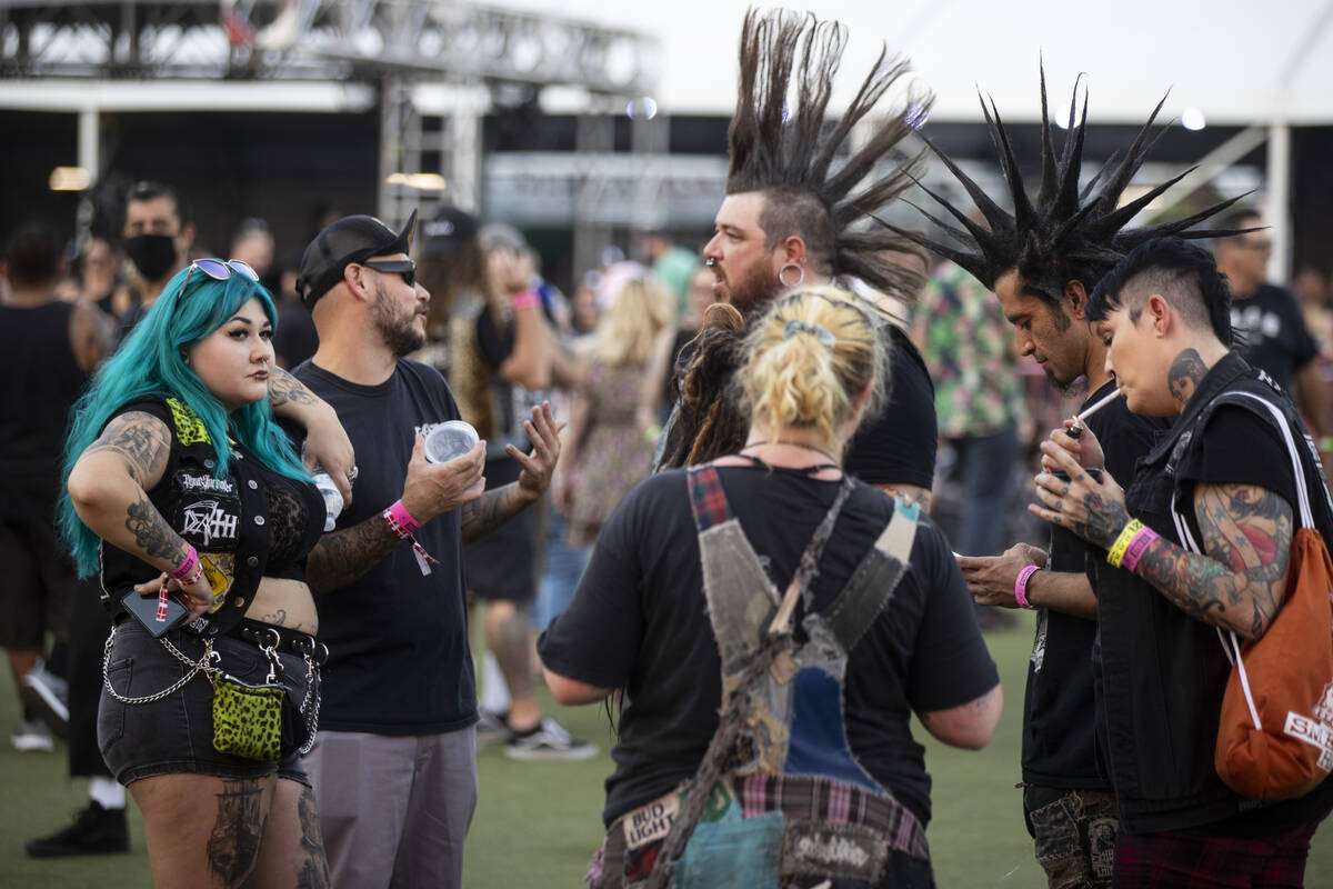 People attend the Punk Rock Bowling Music Festival at the Downtown Las Vegas Events Center in L ...