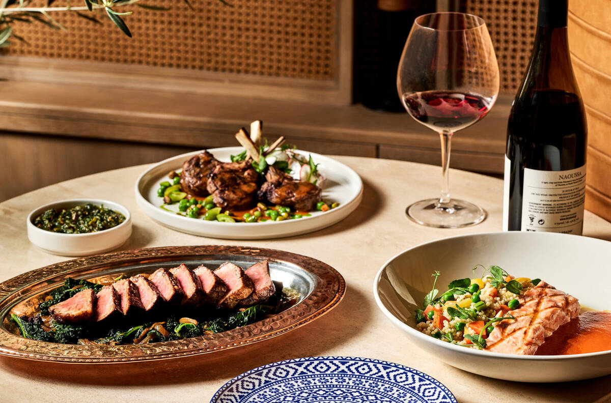 Beef mishwi, grilled lamb chops and grilled salmon at Zaytinya, a Mediterranean restaurant from ...