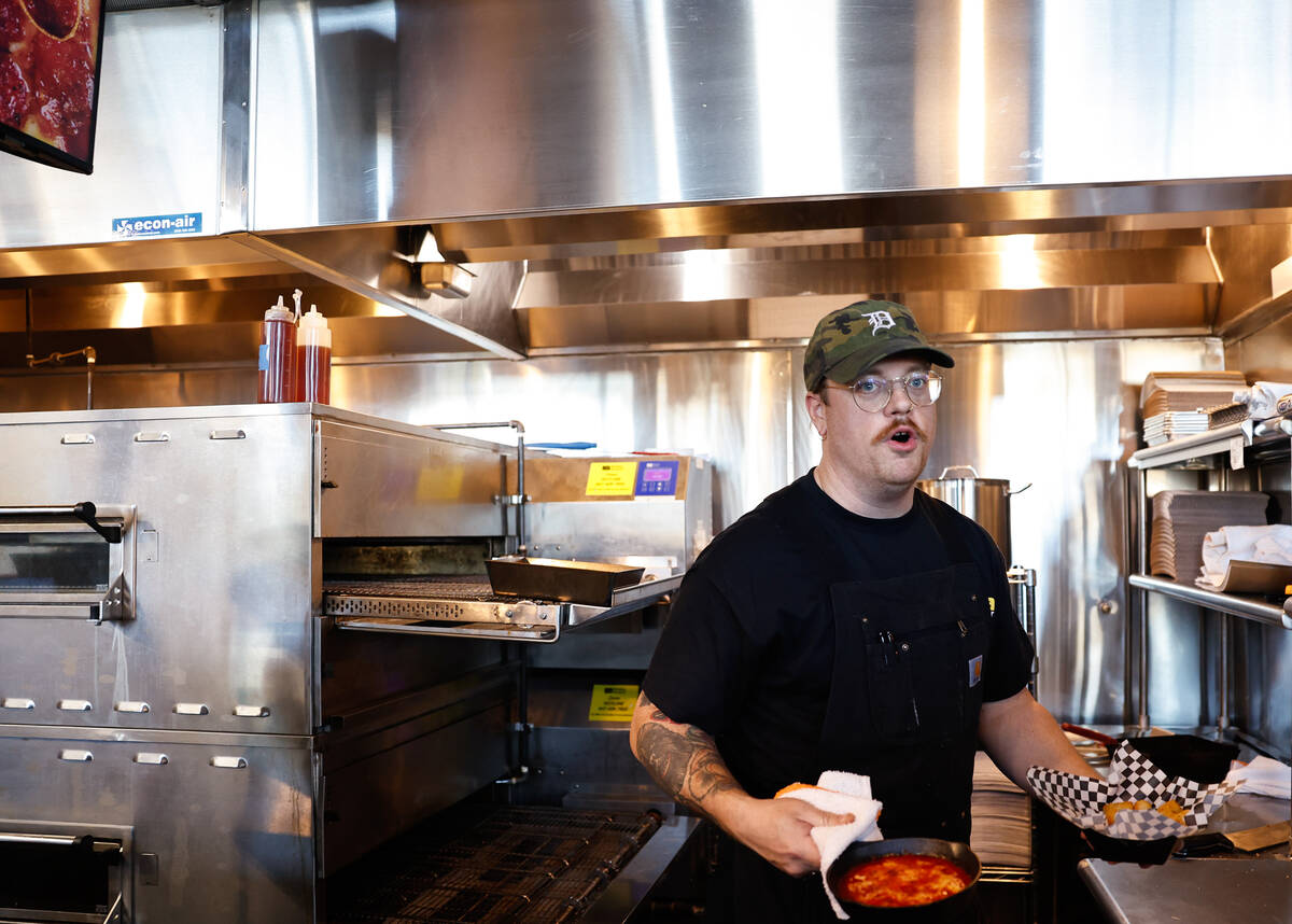 Chef-owner Robby Cunningham works in the kitchen at Guerrilla Pizza Wednesday, Dec. 3, 2025 in ...