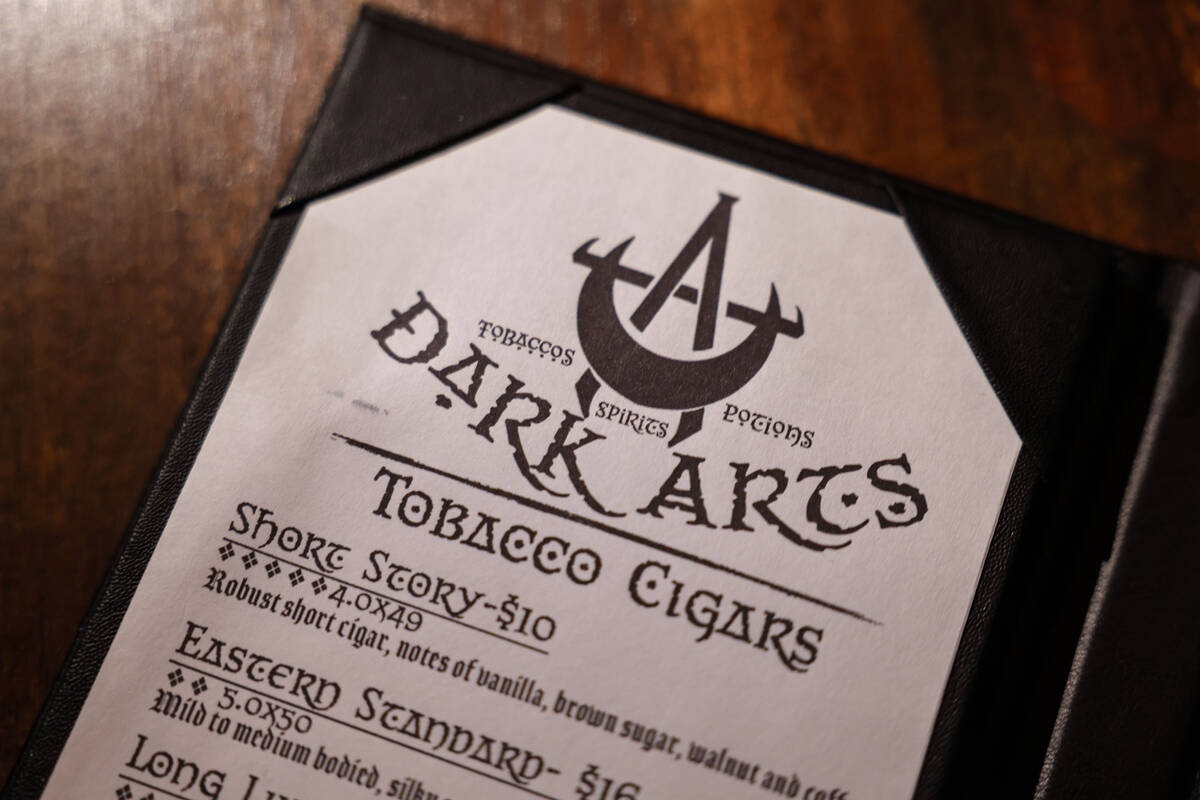 A cigar menu is photographed in The Dark Arts room at Grey Witch Tuesday, Nov. 25, 2025 in Las ...