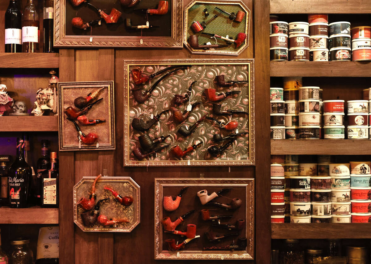 Colorful pipes, tins and liquor bottles are photographed at The Dark Arts room at Grey Witch Tu ...