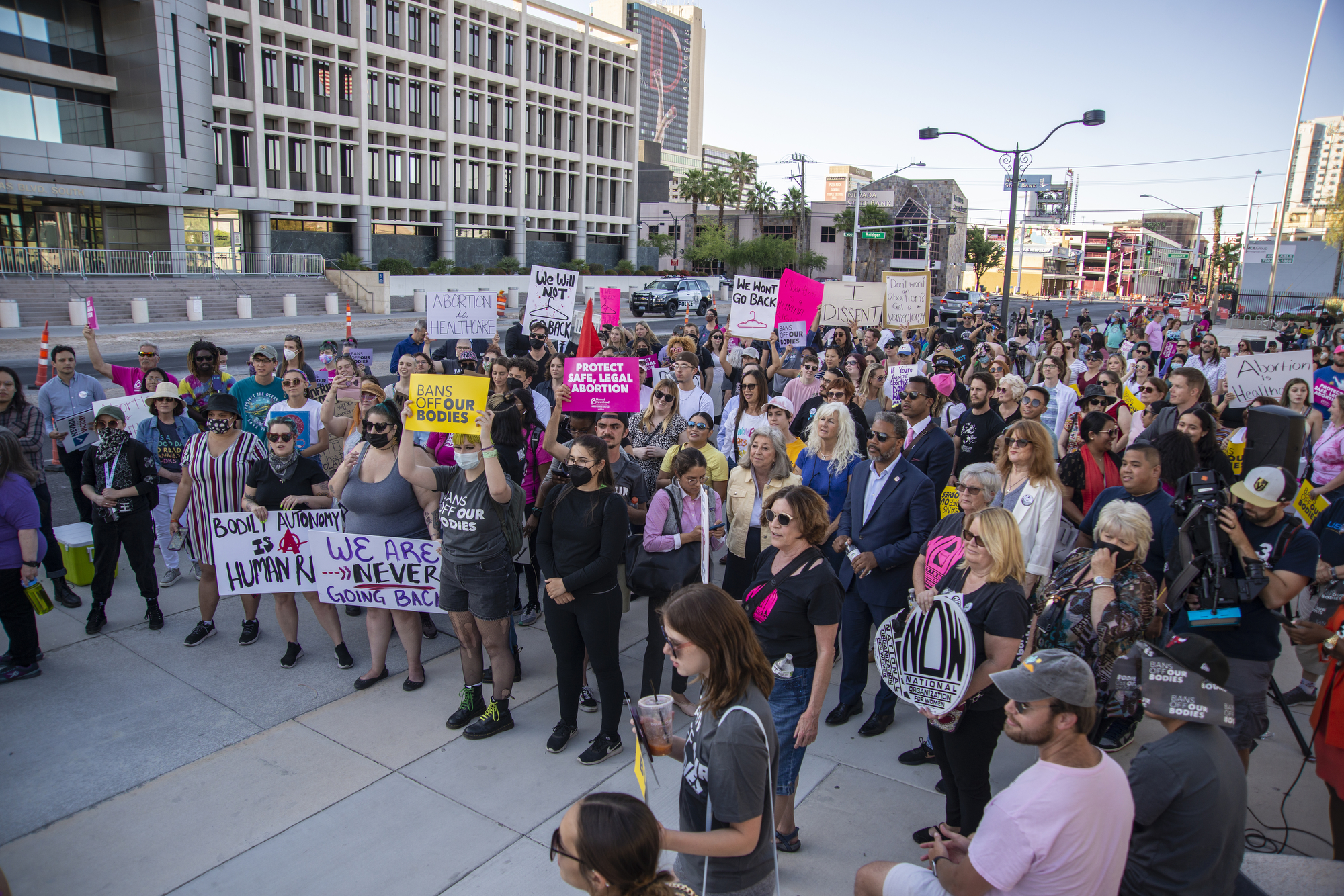 A crowd gathers during a reproductive health rights demonstration in front of the Lloyd D George Federal Courthouse in downtown Las Vegas.
