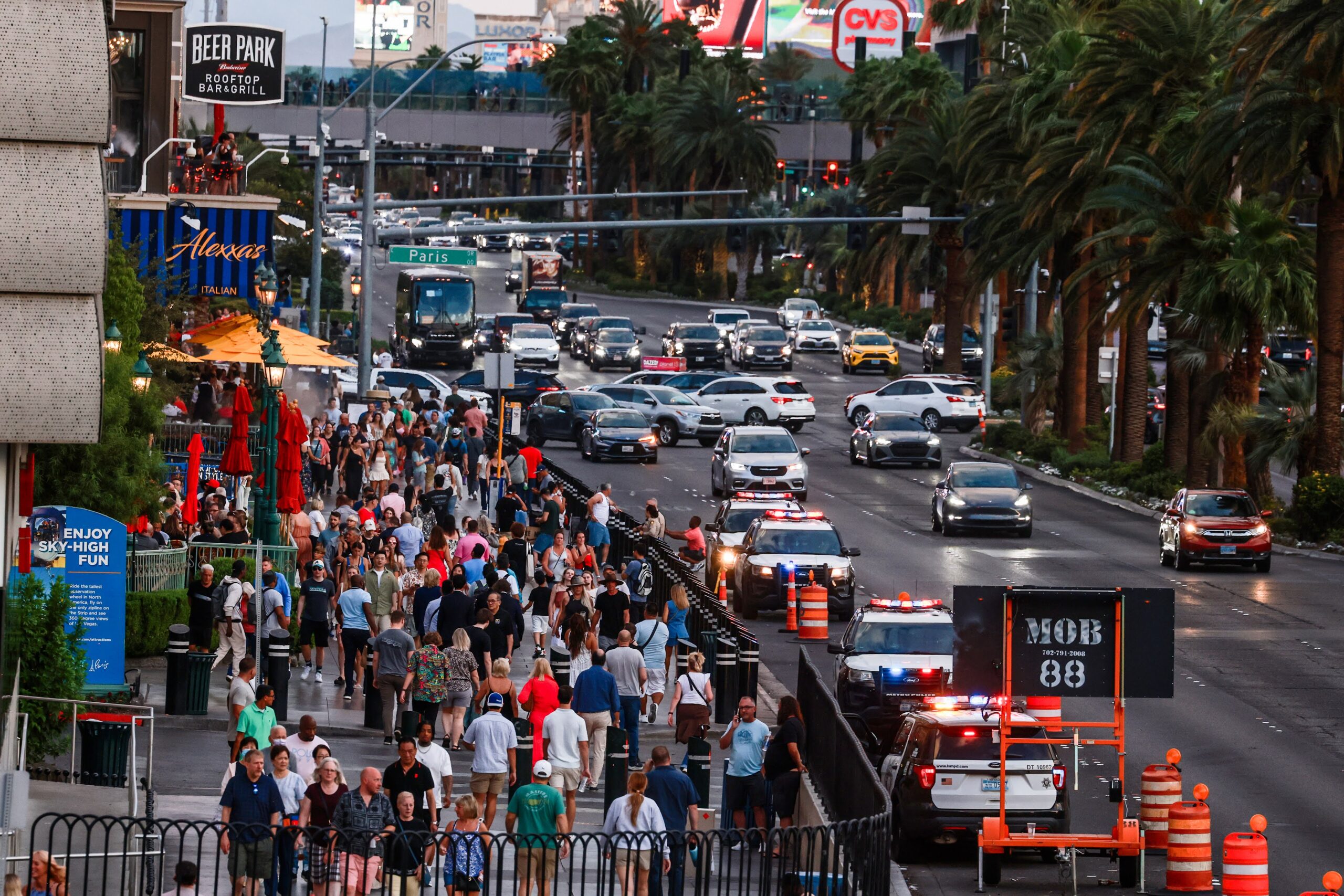 Strip visitors crowd the sidewalk near the Horseshoe Las Vegas and Paris Las Vegas on June 9, 2025.