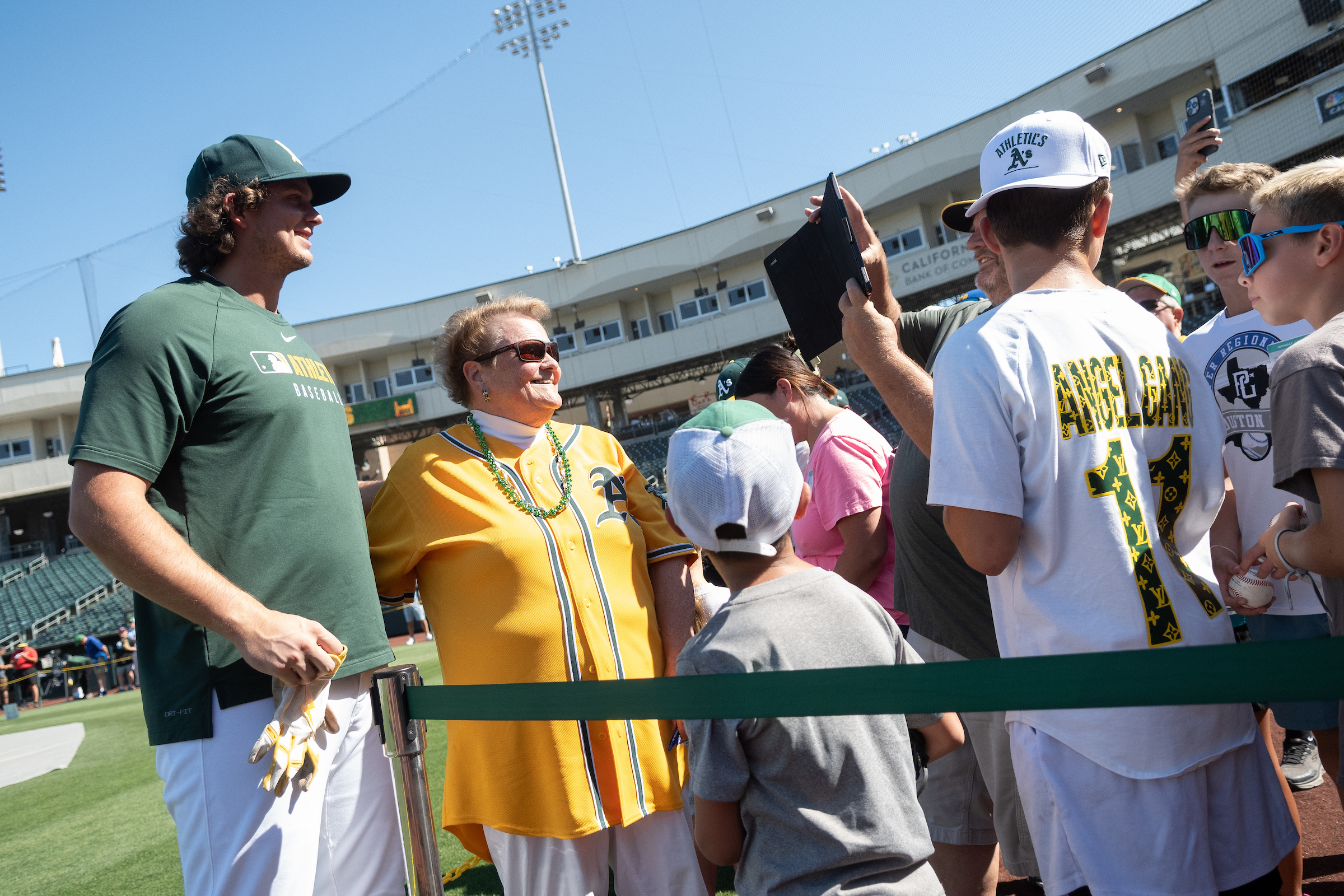 Athletics first baseman Nick Kurtz visits with fans on the field of Sutter Health Park in Sacramento before the team's game with the Seattle Mariners on July 28, 2025.