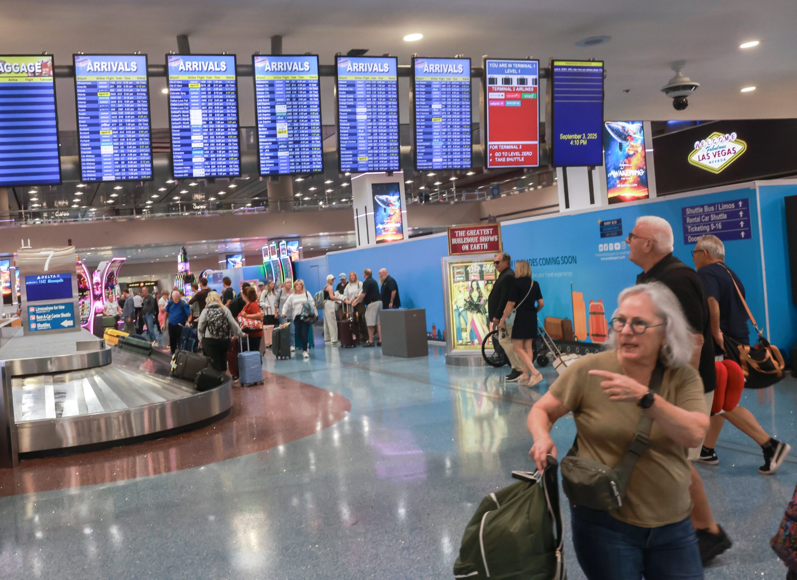 Passengers arrive at Harry Reid International Airport.