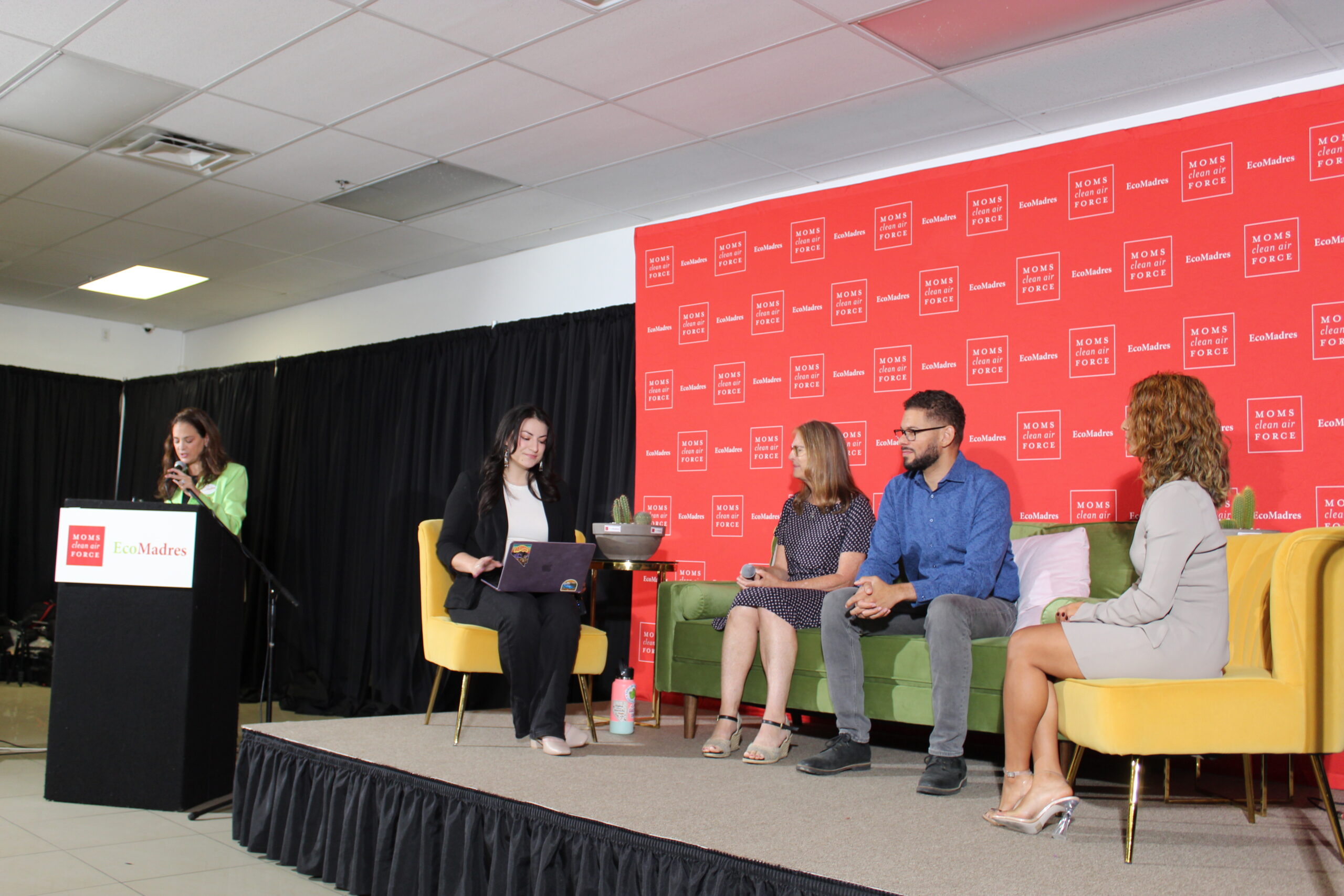 Isabel González Whitaker, left, introduces panelists Jannelle Calderon, Dr. Joanne Leovy, Assm. Howard Watts, and Mary Wagner during a panel.
