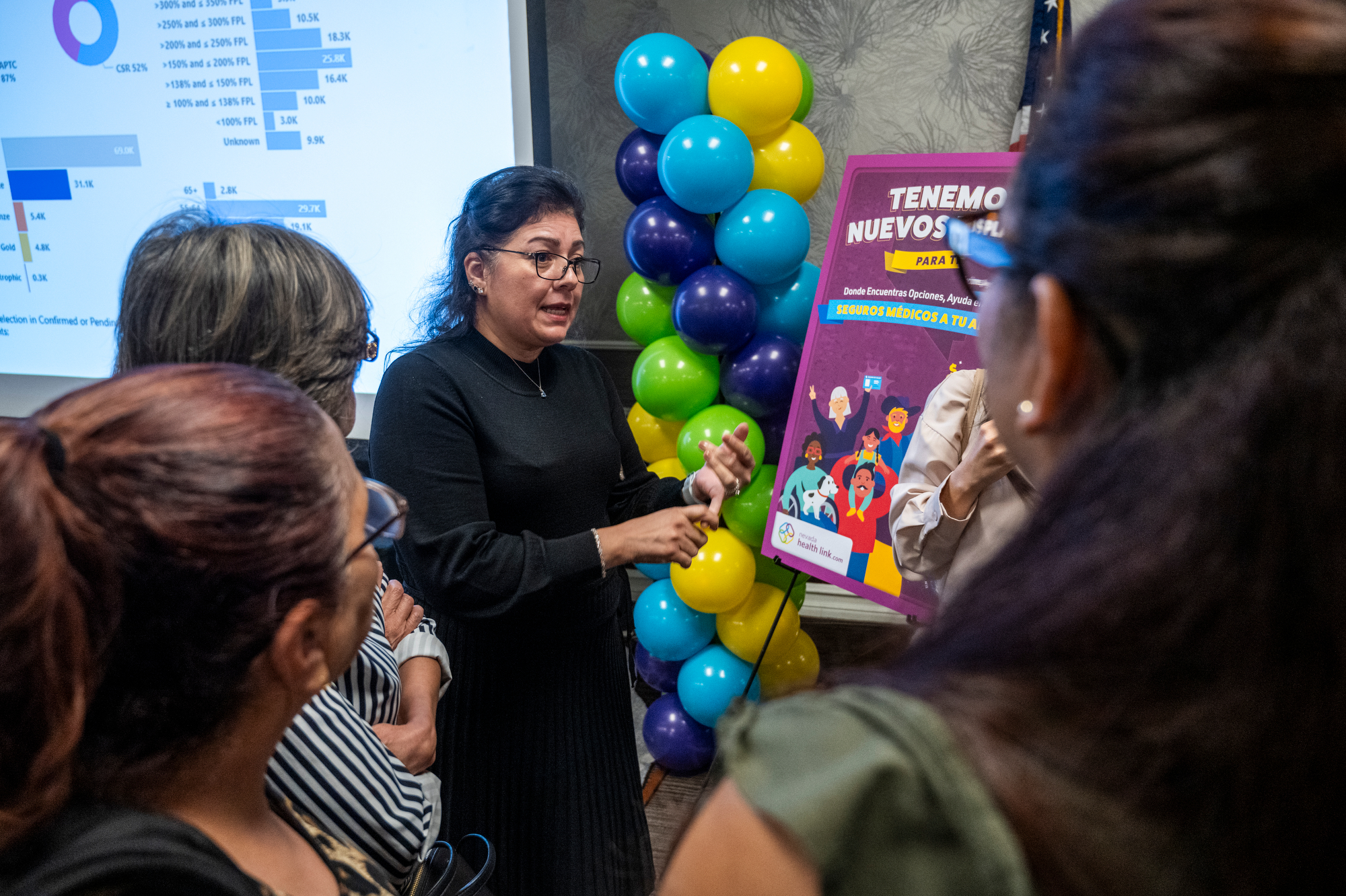 Rosa Alejandre, navigator program manager of Nevada Health Link, answers questions from brokers during a Nevada Health Link event in Las Vegas.