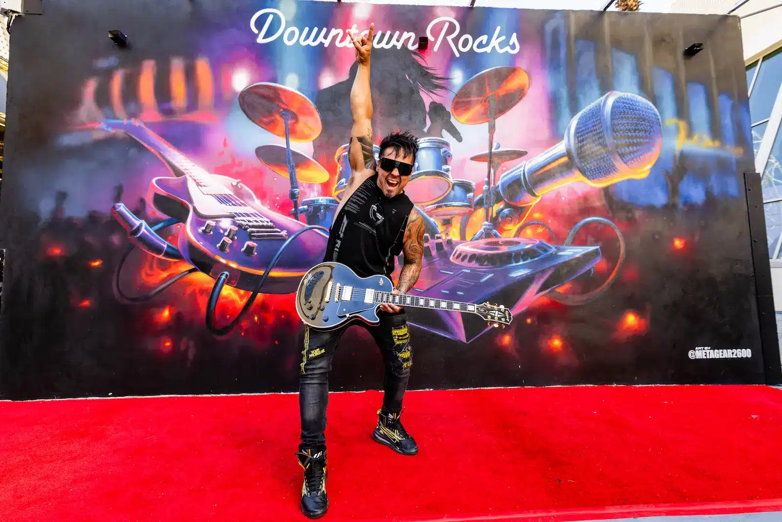 Downtown Rocks 1 Las Vegas Graffiti Artist Gear Duran in front of the new Downtown Rocks Mural