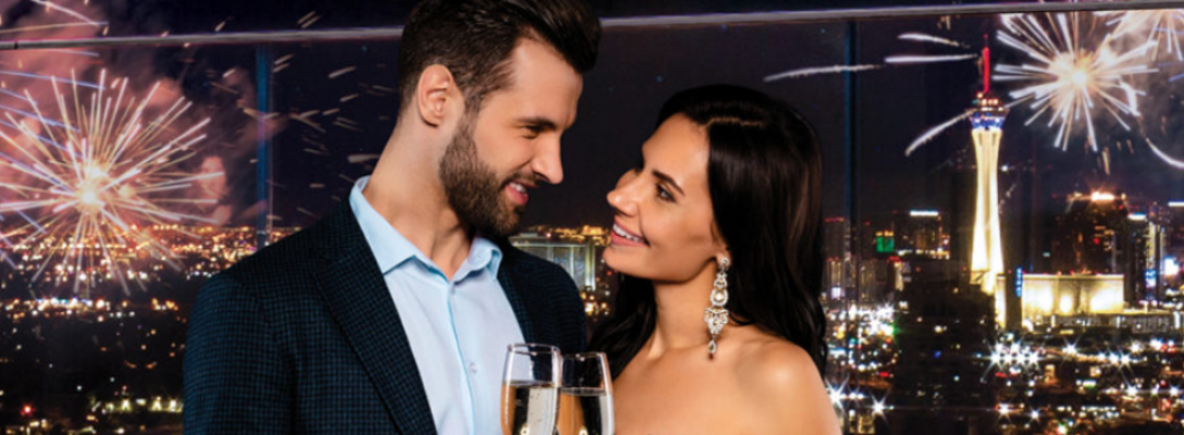 Couple Toasting at Las Vegas Fireworks Show from Legacy Club