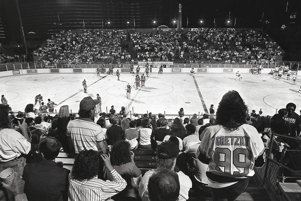 Scenes from an outdoor NHL exhibition game between the New York Rangers and the Los Angeles Kin ...