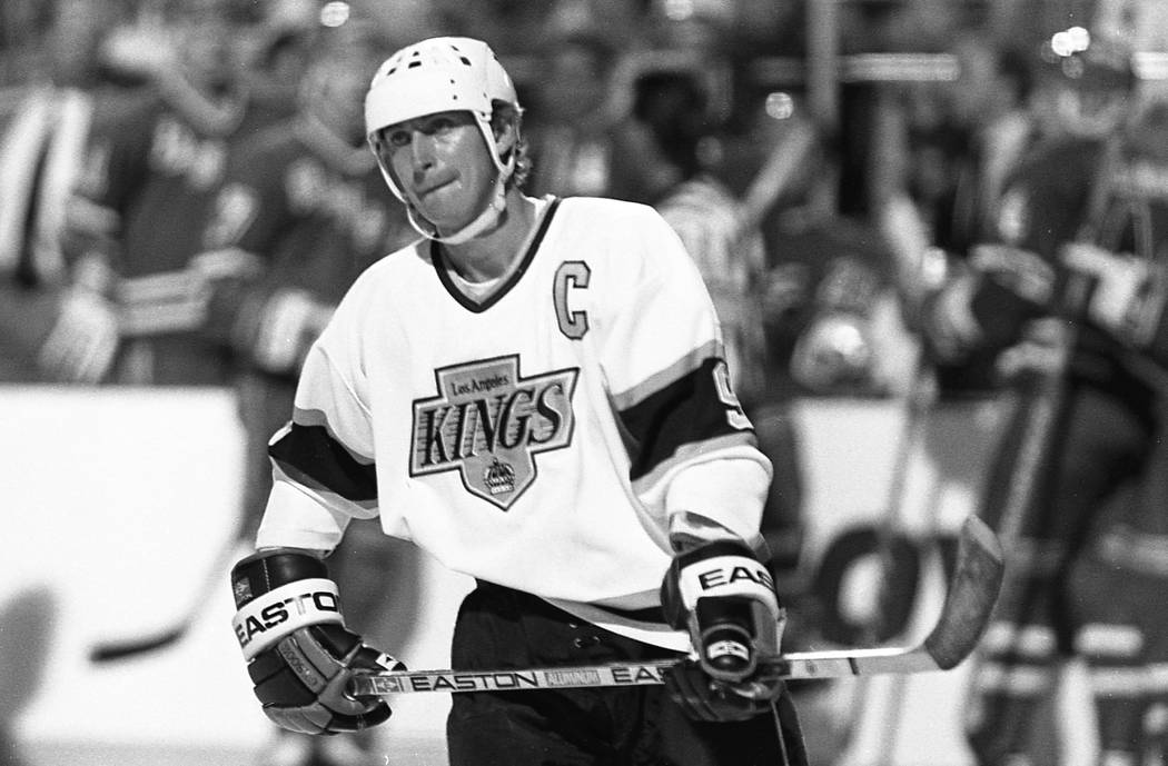 Scenes from an outdoor NHL exhibition game between the New York Rangers and the Los Angeles Kin ...