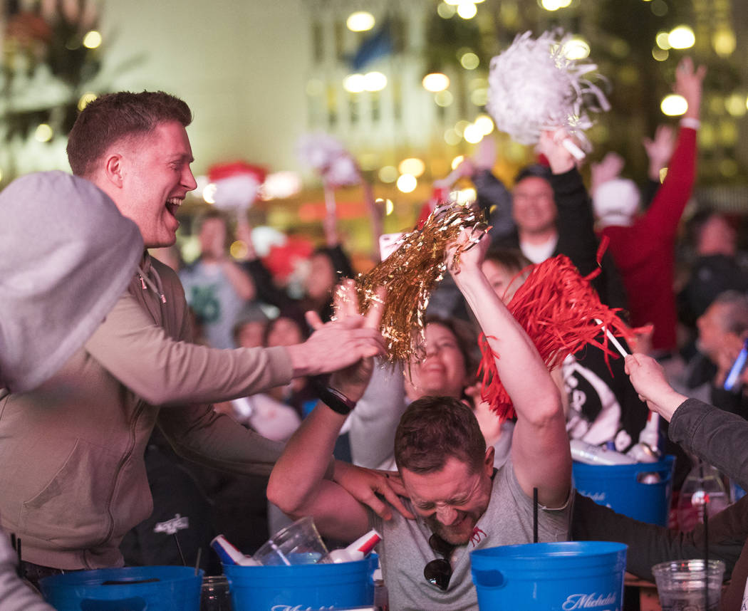The crowd responds to the Kansas City Chiefs winning Super Bowl LIV at a watch party at the Dow ...