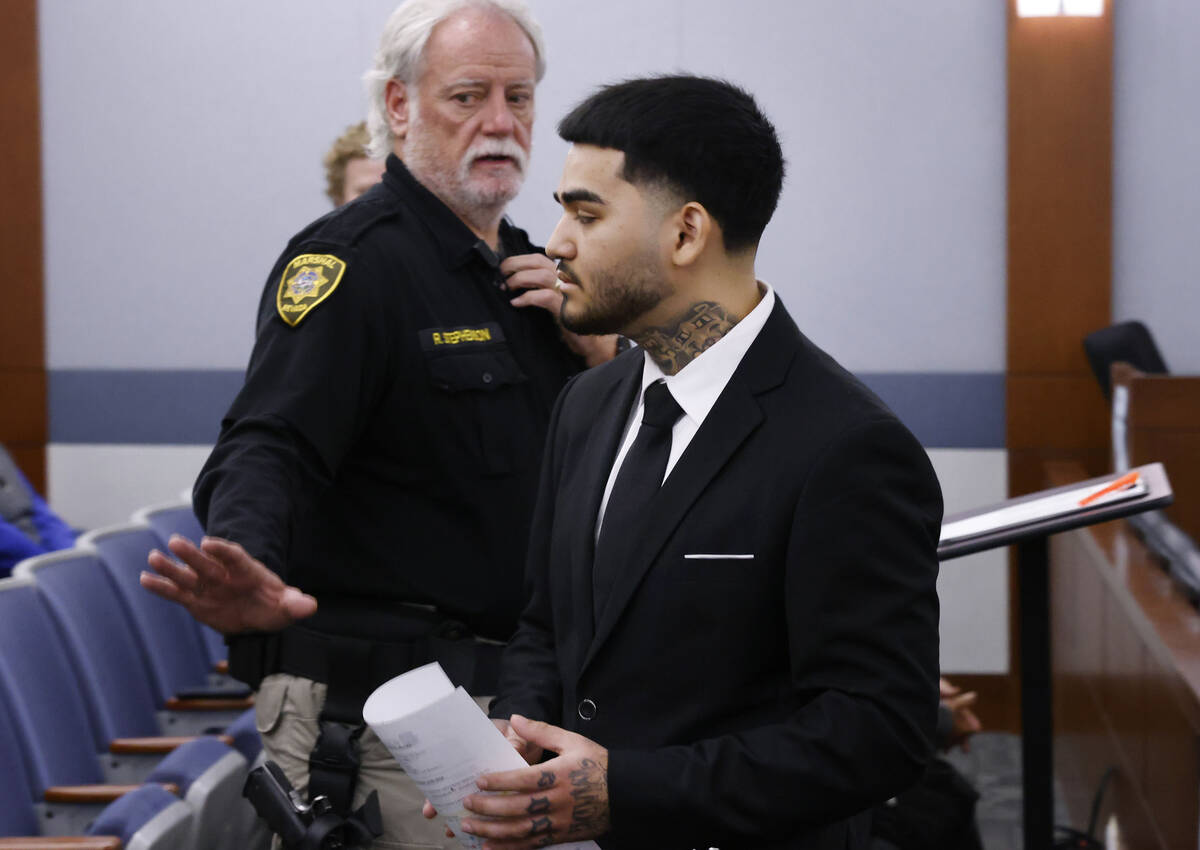 Gabriel Ayala, a teen who killed another teen as payback for a robbery, leaves a courtroom afte ...