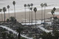 Rain comes down on a neighborhood in the Palisades Fire zone on Tuesday, Oct. 14, 2025, in the ...