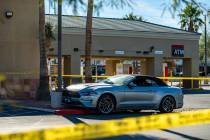 The aftermath of a carjacking outside of a Wells Fargo in Las Vegas Dec. 1, 2025. The suspect w ...