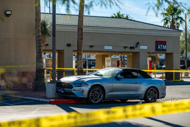 The aftermath of a carjacking outside of a Wells Fargo in Las Vegas Dec. 1, 2025. The suspect w ...