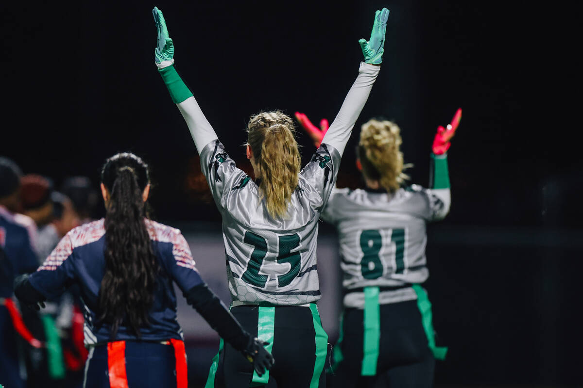 Palo Verde players celebrate a touchdown during a high school flag football game between Corona ...
