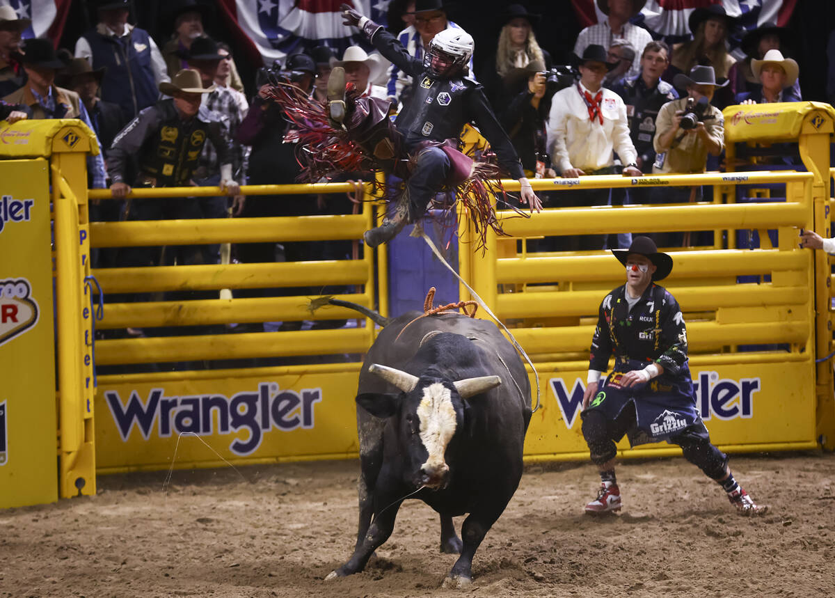 Rawley Johnson gets bucked off of Evil Intentions while competing in bull riding during the ope ...