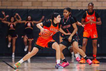 Mojave’s Isabella Crawford dribbles the ball during a basketball game between Mojave and ...